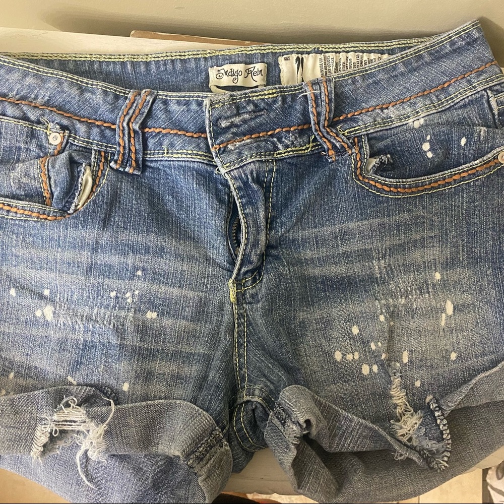 Destroyed denim shorts